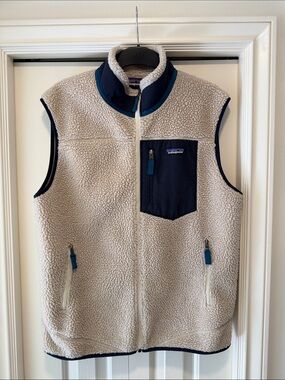 Patagonia Men’s Cream Sherpa Vest with Navy Pocket and Trim